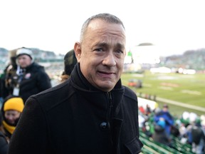 Hollywood legend Tom Hanks poses for a photo before the 2013 Grey Cup game in Regina.