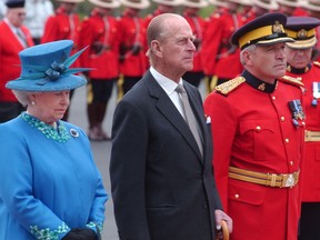 The Duke of Edinburgh, centre, in Regina with Queen Elizabeth II during the couple's visit in 2005.