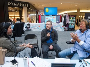 Z99 radio hosts Lorie, left, and CC, right, speak with Brett Coates, executive general manager of Applebee's Regina, during the Radiothon in March 2019 at the Cornwall Centre.