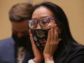 Debbie Baptiste, Colten Boushie's mother, sits at a news conference on March 22, 2021 following the release of a report by the Civilian Review and Complaints Commission for the RCMP that examined how officers handled the investigation into Boushie's death.