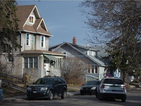 Police sit at a scene on the 1500 block of Cameron Street in Regina, Saskatchewan on April 8, 2021. A news release from the Regina Police Service indicates a death investigation is underway in the area.