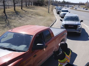 Despite an advisory warning against non-essential travel to and from the Regina zone, going to get vaccinated at the city's drive-thru site is considered acceptable.