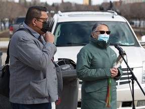 Ochapowace Nation Chief Margaret Bear speaks during a demonstration held in front of the Saskatchewan Legislative Building in Regina, Saskatchewan on April 19, 2021. The demonstration was held to raise awareness around the situation facing inmates at the Regina Correctional Centre during the COVID-19 pandemic. On frame left is Ochapowace headman Luke George. BRANDON HARDER/ Regina Leader-Post