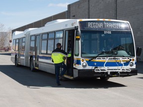 One of Regina's new 60-foot articulating transit busses, pictured here at a compound on Winnipeg Street, will accommodate up to 100 passengers. 

BRANDON HARDER/ Regina Leader-Post
