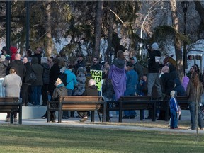 A large gathering of anti-vaccine/anti-mask demonstrators are seen gathered at the cenotaph in Victoria Park in Regina on April 24, 2021.
