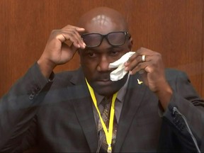 Philonise Floyd speaks about his brother as he answers questions during the eleventh day of the trial of former Minneapolis police officer Derek Chauvin for second-degree murder, third-degree murder and second-degree manslaughter in the death of George Floyd in Minneapolis, Minn., April 12, 2021 in a still image from video.