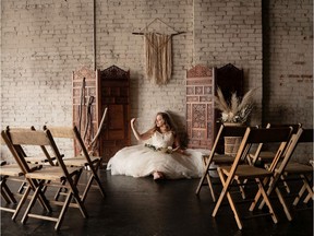 Test model Chantal Day poses for wedding photographer Lindsey Helland. Helland's business declined greatly during the pandemic. She used to cover 10-14 weddings per year, but now clients are few and far between.