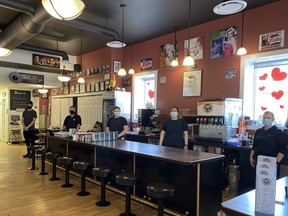 Staff stand in Deja Vu Cafe in Moose Jaw. Owner Brandon Richardson decided to temporarily move to takeout and delivery orders only starting April 7, 2021 because of the COVID-19 pandemic.
