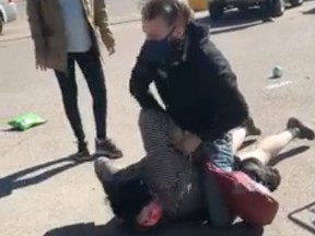 The FreshCo grocery store on 33rd Street and Avenue C North in Saskatoon ended its contract with a security guard after video was shared of the man attempting to handcuff an Indigenous woman by wrestling with her on the ground and then throwing himself on top of her after she gets into her vehicle on April 14, 2021.