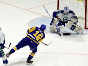 Saskatoon Blades' Blake Stevenson shoots against Swift Current Broncos goalie Isaac Poulter at the Brandt Centre on Wednesday. Stevenson had two goals in the Blades' 3-0 victory.