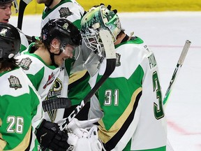 Prince Albert Raiders goalie Max Paddock (31) is congratulated on a 4-0 shutout victory over the Saskatoon Blades at the Brandt Centre on Thursday.