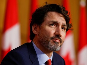 Prime Minister Justin Trudeau looks on during a news conference in Ottawa, March 30, 2021.