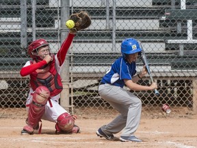 Saskatoon Selects catcher Ray Rayne tries to corral the ball during the 2019 Canadian u-14 softball championships.