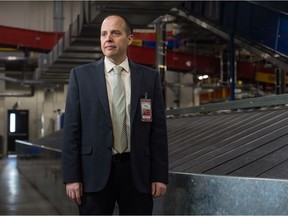 Regina International Airport CEO James Bogusz stands in the baggage handling area in the airport in Regina, Sask. on April 6, 2021. BRANDON HARDER/ Regina Leader-Post