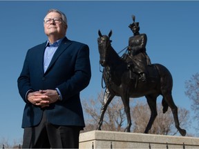 Ralph Goodale stands near the statue of the Queen across from the Saskatchewan Legislative Building in Regina, Saskatchewan on April 21, 2021.