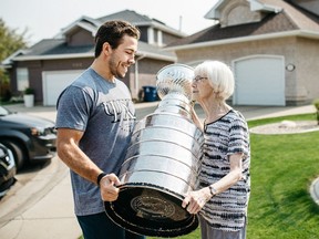 Chandler Stephenson and his grandmother Ruth Stephenson share a moment with the Stanley Cup in the summer of 2018. (Photo by Chelsea Klette)