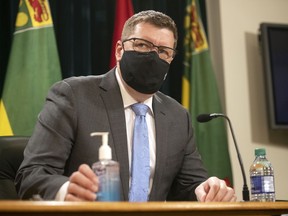 Premier Scott Moe and Saskatchewan's Chief Medical Health Officer, Dr. Saqib Shahab (remote location) provide a COVID-19 update at the Legislative Building in Regina on Monday, May 10, 2021.