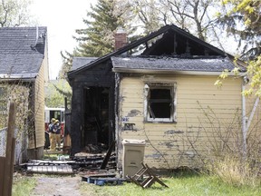 Members of the Regina Fire & Protective Services attend a house fire on the 700 block of Garnet Street in Regina on May 14. Regina fire reported that while the house sustained extensive smoke and fire damage, no one was injured. The cause of the blaze is under investigation.