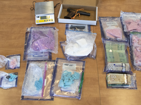 Regina police seized 2.8 kilograms of fentanyl, 450 grams of cocaine, $43,000 cash, and a loaded handgun in a bust this week, according to a news release issued May 27, 2021. (Photo courtesy Regina Police Service)