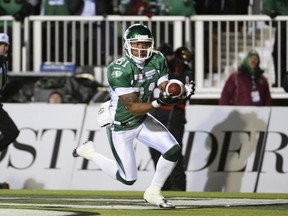 The Saskatchewan Roughriders' Geroy Simon catches his first of two touchdown passes in the 2013 Grey Cup game on Taylor Field.