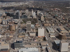 An aerial photo shows Regina's downtown including such local landmarks as City Hall, the Hill Towers, Court of Queen's Bench, the Hotel Saskatchewan, the Capital Pointe hole and the intersection of Albert Street and Victoria Avenue.
