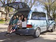 From left to right, Tim Davies, Shaylee Booty, Poppy Booty-Davies and Hazel Booty-Davies run a restaurant in their 1995 Toyota Previa, where they hand out home-made pizzas and donate the proceeds to charity.