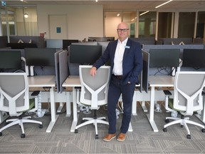 Conexus CEO Eric Dillon stands inside an empty workspace inside the credit union's new headquarters on College Avenue in Regina, Saskatchewan on June 8, 2021. He believes the workspace will remain more flexible even after the pandemic.