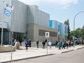 REGINA, SASK : June 10, 2021  -- People stand in line for a walk-in COVID-19 vaccine clinic at the mâmawêyatitân centre in Regina, Saskatchewan on June 10, 2021.

BRANDON HARDER/ Regina Leader-Post