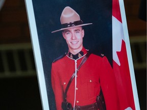 REGINA, SASK : June 12, 2021 -- A portrait of RCMP Cst. Shelby Patton, who died while on duty, is seen at at RCMP 'F' Division headquarters in Regina, Saskatchewan on June 12, 2021. Beside her is a photo of Cst. Patton.