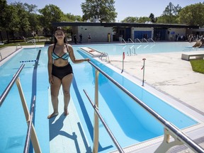 Thirteen-year-old Lilla Fayant stands on the diving board at the new Maple Leaf Pool on Tuesday, June 22, 2021 in Regina. Fayant was instrumental in rallying to have a new pool built after it was announced the old pool was going to be permanently closed.