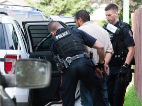 Regina police make an arrest during an operation in the area of Dolan Street and Wheatly Bay in Regina, Saskatchewan on June 24, 2021. BRANDON HARDER/ Regina Leader-Post
