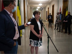 Saskatchewan Deputy Premier and Finance Minister Donna Harpauer speaks with media during a news conference held at the Saskatchewan Legislative Building in Regina, Saskatchewan on June 30, 2021.