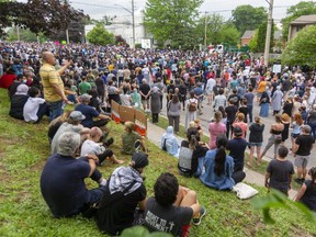 A huge crowd gathered at the London Muslim Mosque for a vigil Tuesday night. (Mike Hensen/The London Free Press)