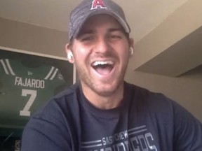 Saskatchewan Roughriders quarterback Cody Fajardo, shown wearing a Los Angeles Angels cap during Zoom call on Tuesday, excelled in baseball before opting to concentrate on football.