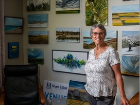 Janet Akre paints at home in Outlook, Sask. on Thursday, June 17, 2021.