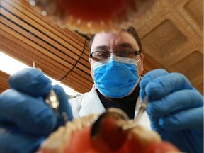 Dr. Gerry Uswak performs a mock check up at the training clinic at the University of Saskatchewan in Saskatoon on November 2, 2017.