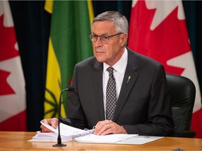 Saskatchewan minister responsible for Crown corporations Don Morgan speaks to media during a news conference, regarding SaskPower's annual report in July.
