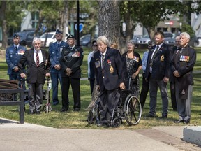 Veterans unveil plaques at the Regina Cenotaph in Victoria Park to honour veterans of The Korean War and Second World War's D-Day invasion.