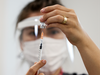 A nurse prepares a dose of the Pfizer-BioNTech COVID-19 vaccine at Ankara City Hospital in Ankara, Turkey, on April 2, 2021.