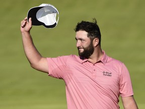 Spain's Jon Rahm acknowledges the crowd on the 18th green after completing his final round at the 2021 Open. REUTERS/Rebecca Naden