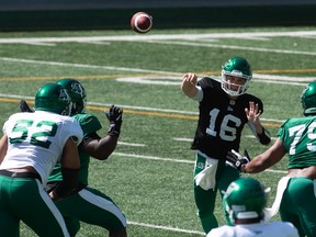 Saskatchewan Roughriders quarterback Isaac Harker, 16, throws a pass during Saturday's controlled scrimmage at Mosaic Stadium. Harker is hoping to retain the No. 2 job he held in 2019.