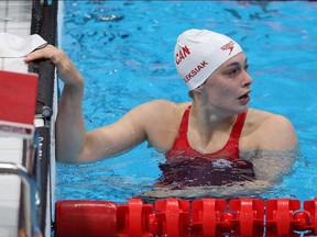 Penny Oleksiak of Team Canada reacts after competing in the first Semifinal of the Women's 100m Freestyle, July 29, 2021 in Tokyo, Japan.