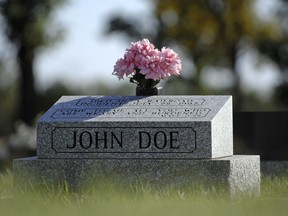 A gravestone marked John Doe in a Regina cemetery. The previously unknown man, who died in 1995, has now been identified.