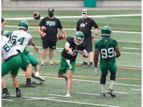 REGINA, SASK : August 3, 2021  -- Saskatchewan Roughriders quarterback Isaac Harker (16) makes a pass during practice at Mosaic Stadium in Regina, Saskatchewan on August 3, 2021.

BRANDON HARDER/ Regina Leader-Post