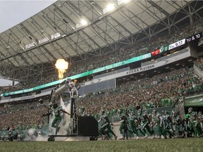 The Saskatchewan Roughriders take the field win their home opener at Mosaic Stadium on Friday, August 6, 2021 in Regina.