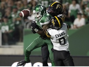 REGINA, SASK :  August 14, 2021 --   Saskatchewan Roughriders wide receiver Kyran Moore (85) can't take the catch between a pair of Hamilton Tiger-Cats defenders on Saturday, August 14, 2021 in Regina.

TROY FLEECE / Regina Leader-Post