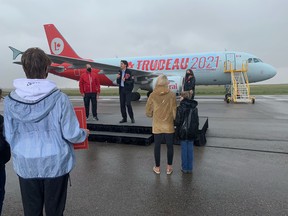 Liberal Leader Justin Trudeau arrives for a campaign stop in rainy Regina on Friday, Aug. 20, 2021.
