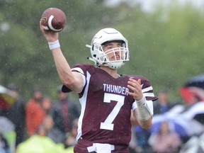 Carter Shewchuk, 7, of the Regina Thunder throws a pass against the host Winnipeg Rifles on Sunday.