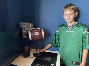 The Saskatchewan Roughriders' Brayden Lenius threw the football into the stands at Mosaic Stadium on Aug. 6 after scoring his first CFL touchdown. The ball was eventually retrieved by 11-year-old Nixon Wiebe, who proudly displays the ball on his desk at home in Saskatoon. Photo courtesy Alyssa Wiebe.