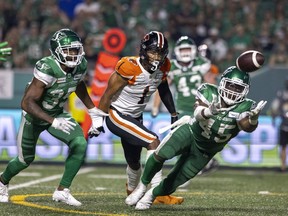 Saskatchewan Roughriders linebacker Deon Lacey dives in an attempt to make an interception Friday against the visiting B.C. Lions. Lacey didn't make the pick, but he did lead the team in defensive tackles (seven) while adding a sack in an impressive debut with the Green and White.